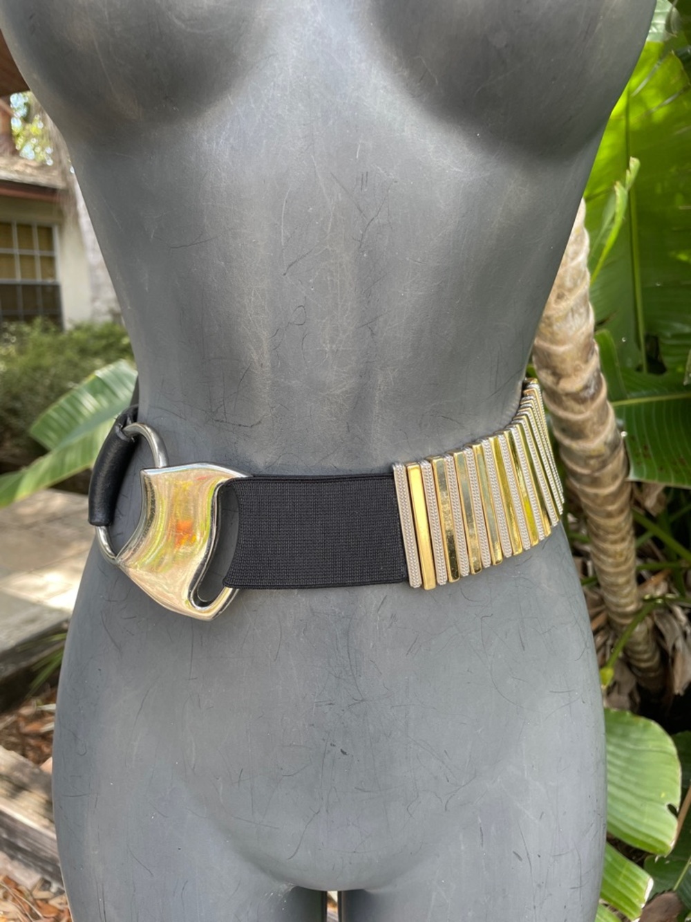 Chico’s gold and silver and black leather statement belt